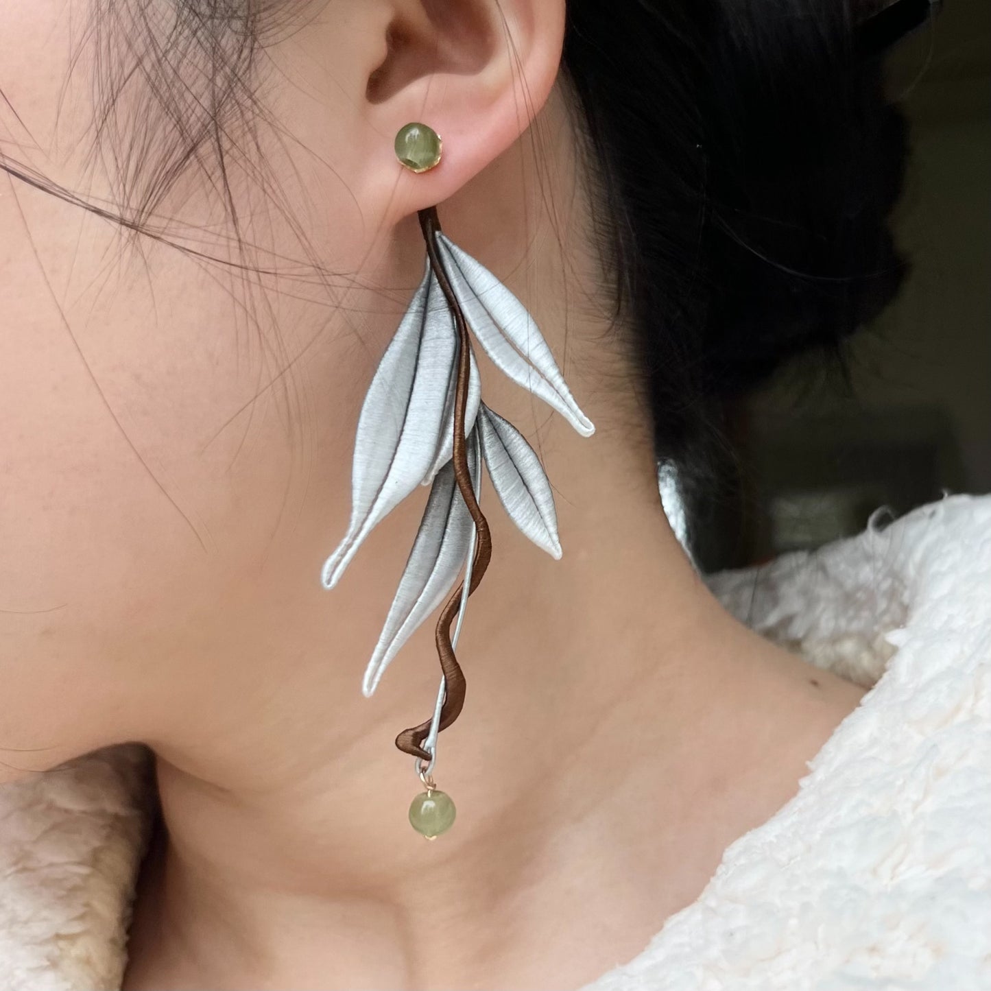 Xu Mo - Somnium inspired handmade chanhua earrings on a person's ear-2