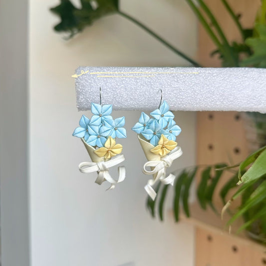 3D thread-wrapped floral earrings featuring a tiny flower bouquet design made with traditional Chanhua techniques.