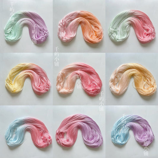Hand-dyed gradient rayon threads in pastel colors for Chanhua and embroidery, showing nine soft color variations arranged neatly on a white background.