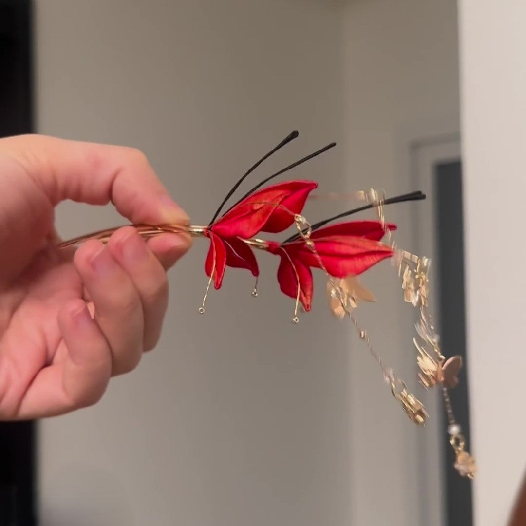 3D thread-wrapped butterfly hair ornament featuring vibrant red wings and artisanal craftsmanship.