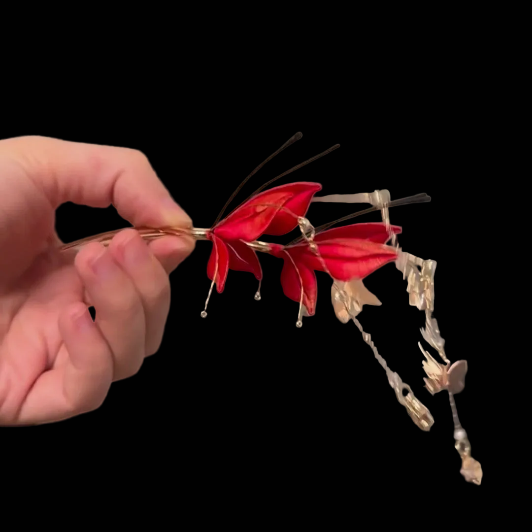 Handcrafted red butterfly Chanhua hairpin with gold-tone accents and delicate dangling charms.