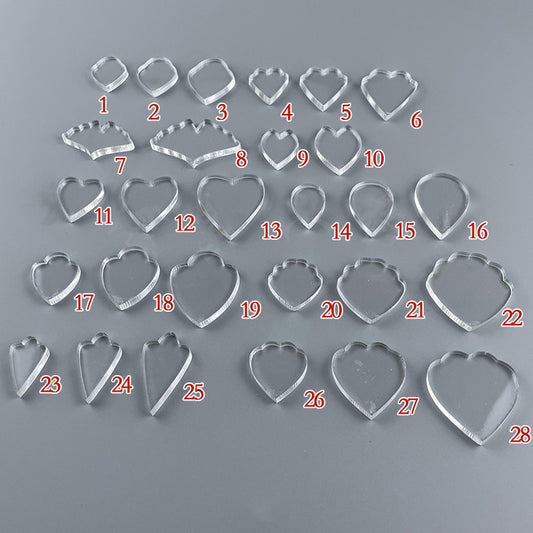 A collection of over 28 different clear acrylic templates for making wire-wrapped flower petals and leaves for DIY jewelry.