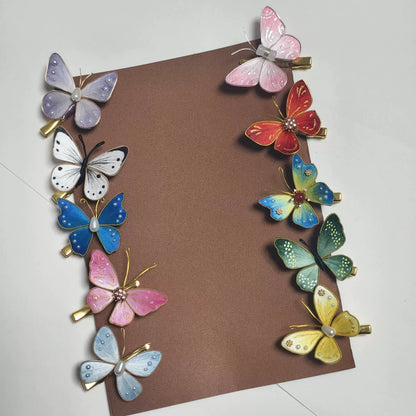 Ten styles of handcrafted Ronghua silk velvet butterfly hair clips in various colors including blue, pink, red, green, and yellow, arranged on a brown card.