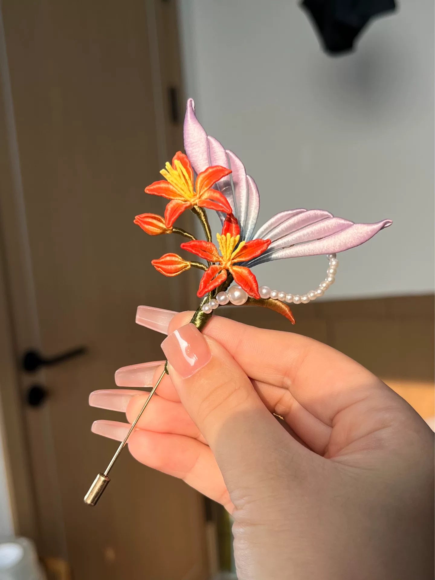 Handmade Chanhua fish - tail galangal lily brooch with orange - red flowers, pastel leaves and pearl accents-3