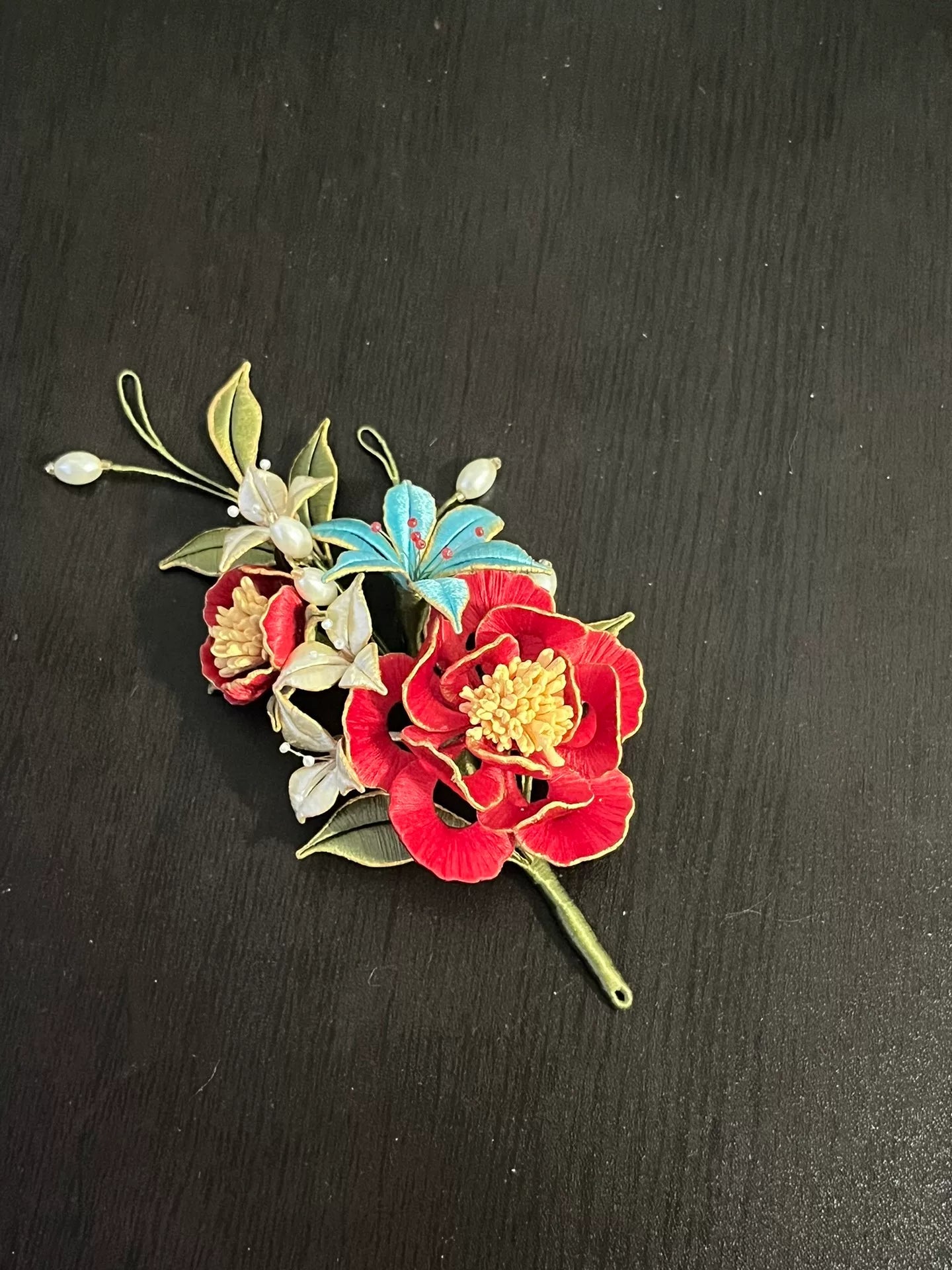 A handmade Chanhua hairpin and brooch with red flowers, green leaves, white flowers, a blue butterfly, and pearls-2