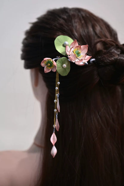 Handmade chanhua lotus hairpin on dark - haired model with pendants