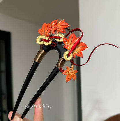 3D thread-wrapped floral hairpin with symbolic copper coins and autumn leaves made using traditional Chanhua techniques.