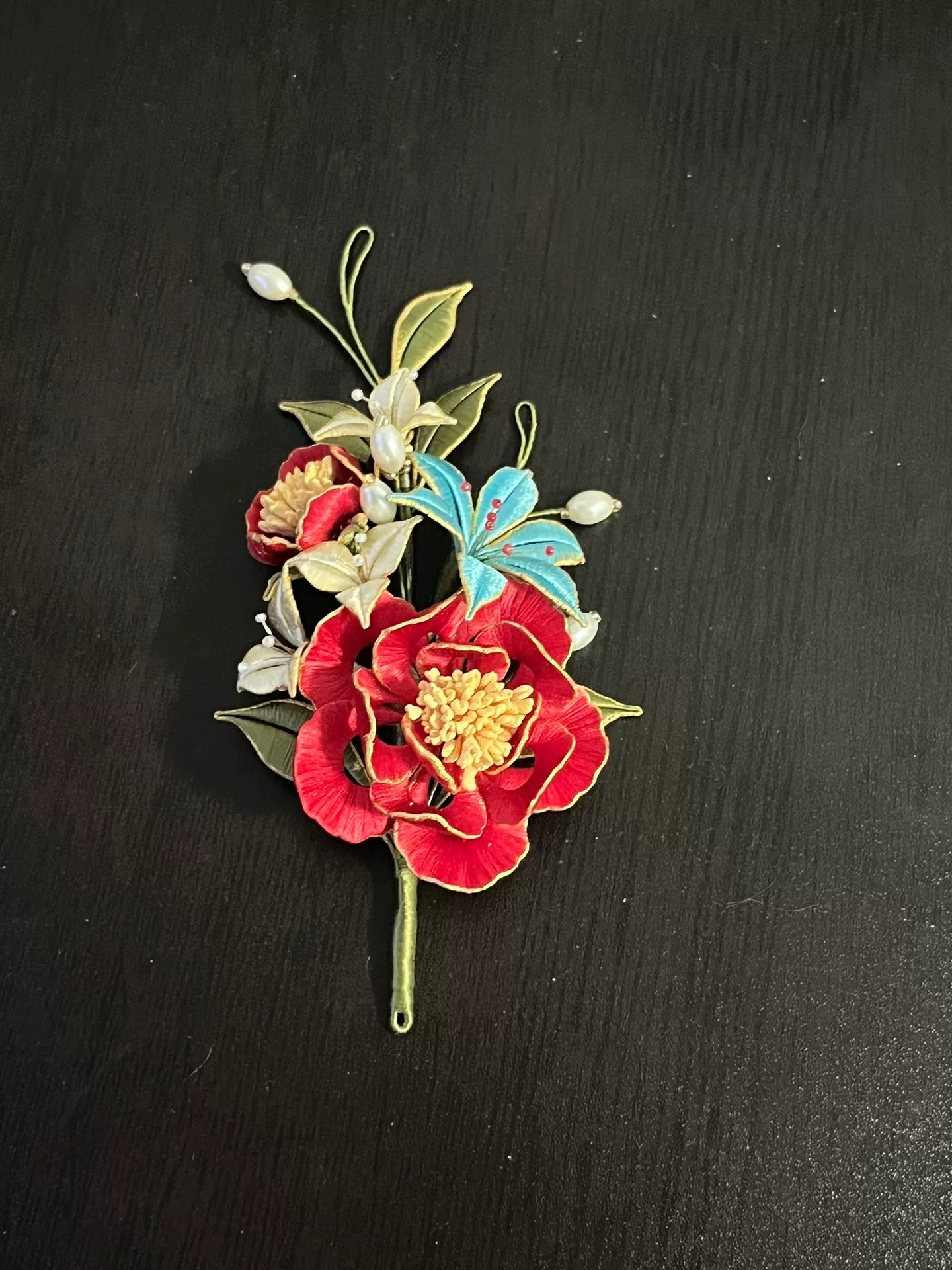 A handmade Chanhua hairpin and brooch with red flowers, green leaves, white flowers, a blue butterfly, and pearls-3