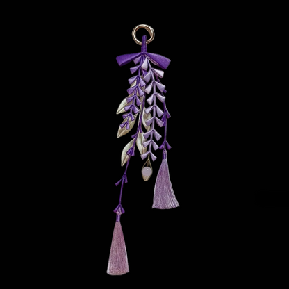 Close-up of Chanhua wisteria pendant showing thread-wrapped purple florets in deep violet and soft lavender tones with cream-gold leaf detail