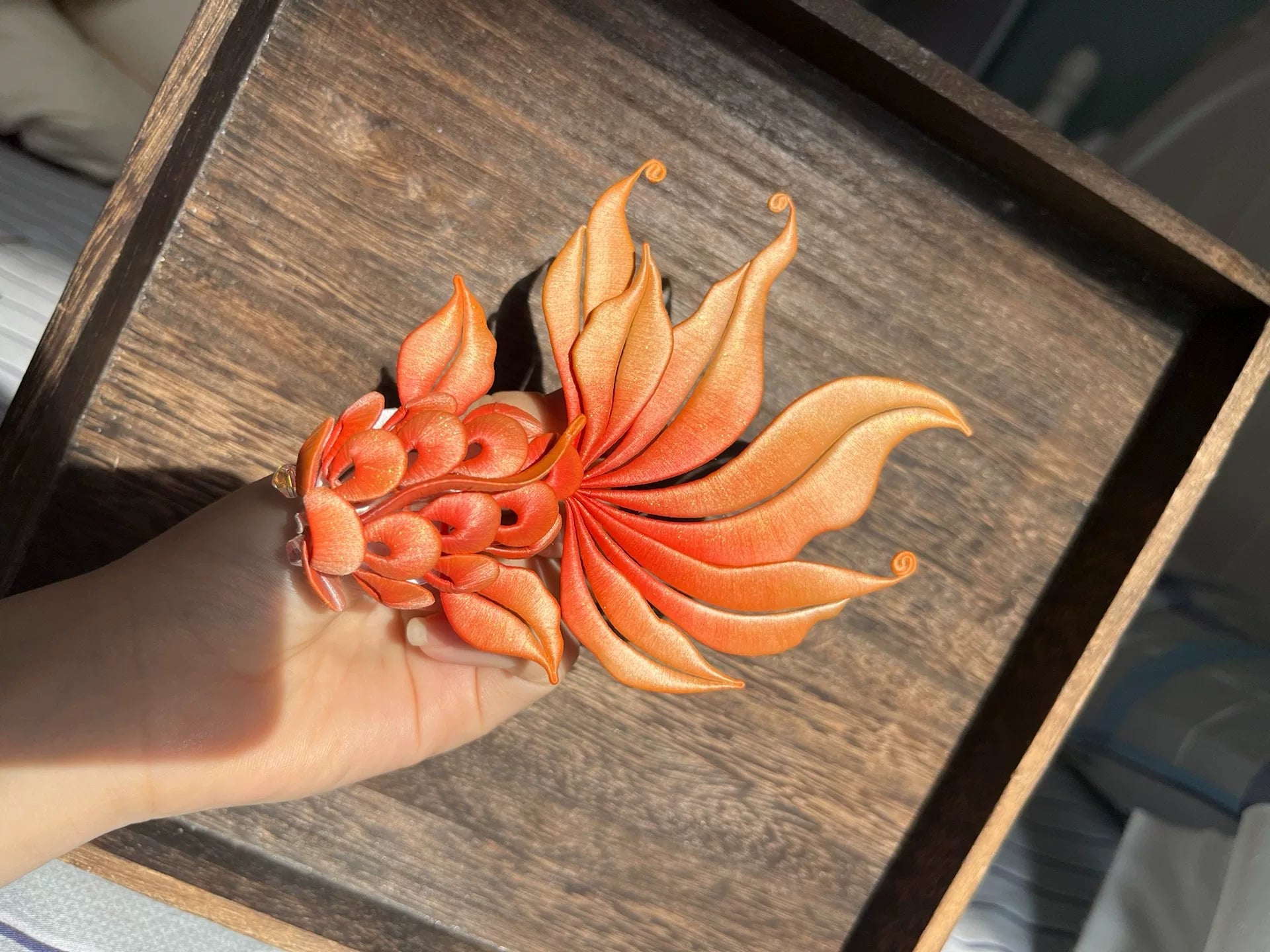 Handmade Chanhua dyed goldfish with orange - red color and flowing fins