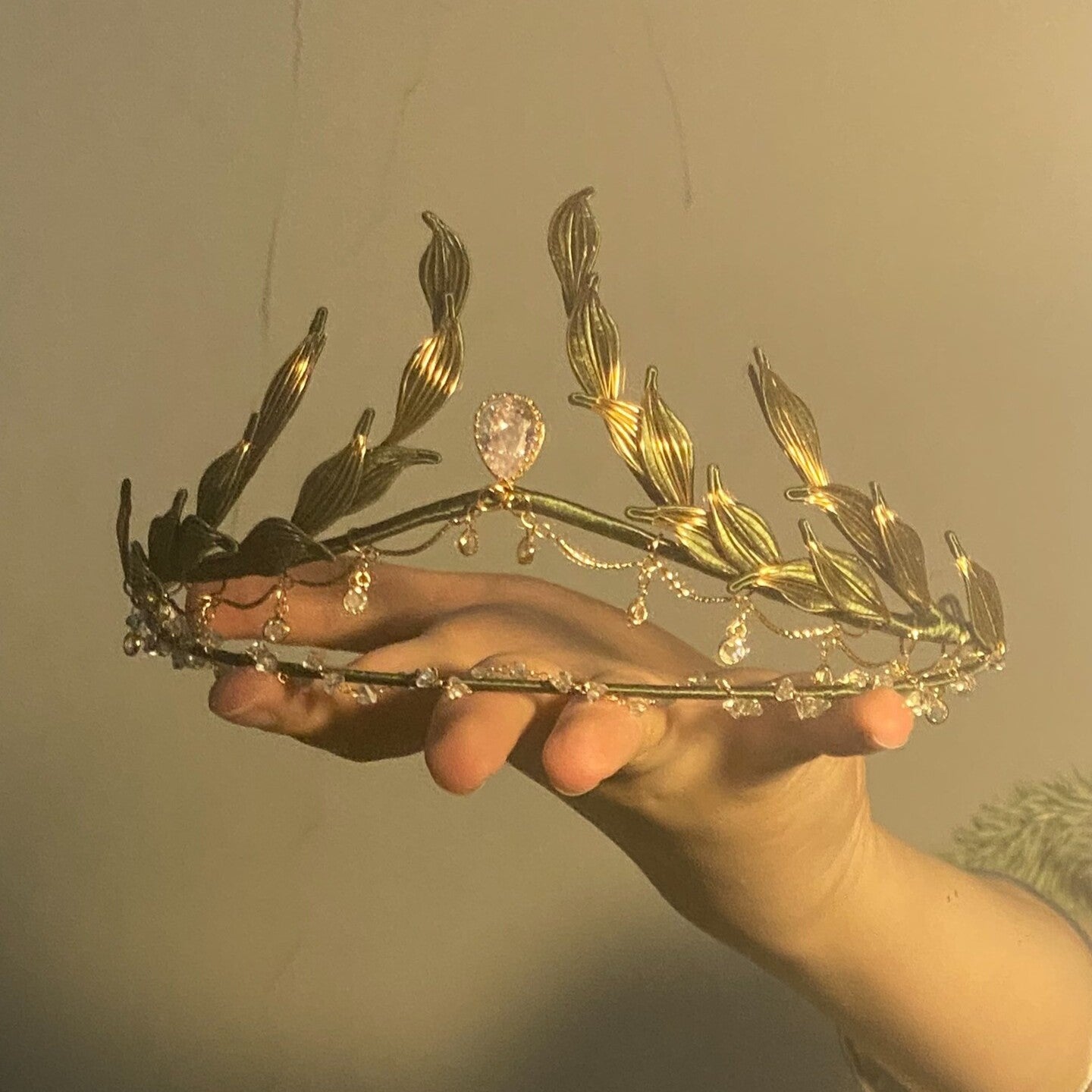 Luxury 3D thread-wrapped laurel tiara with delicate gold-tone chain accents and crystal drops for weddings and galas.