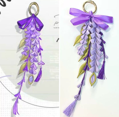 A hand - held purple wisteria keychain with a golden ring and decorative bow-2