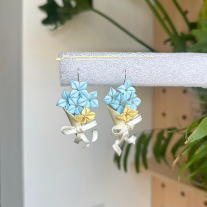 3D thread-wrapped floral earrings featuring a tiny flower bouquet design made with traditional Chanhua techniques.