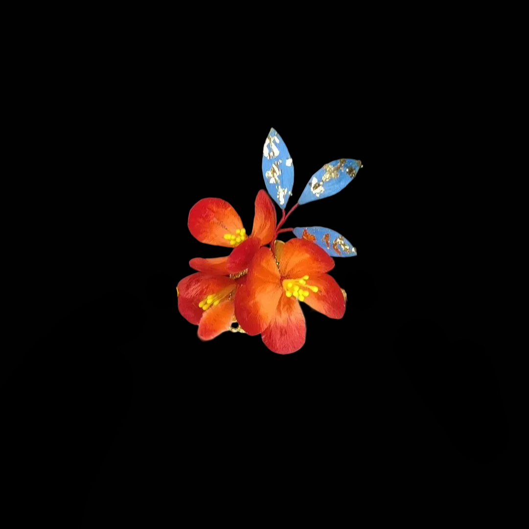 Handcrafted Ronghua red floral hair clip featuring soft velvet-textured silk petals with gold-leaf accents on blue leaves.
