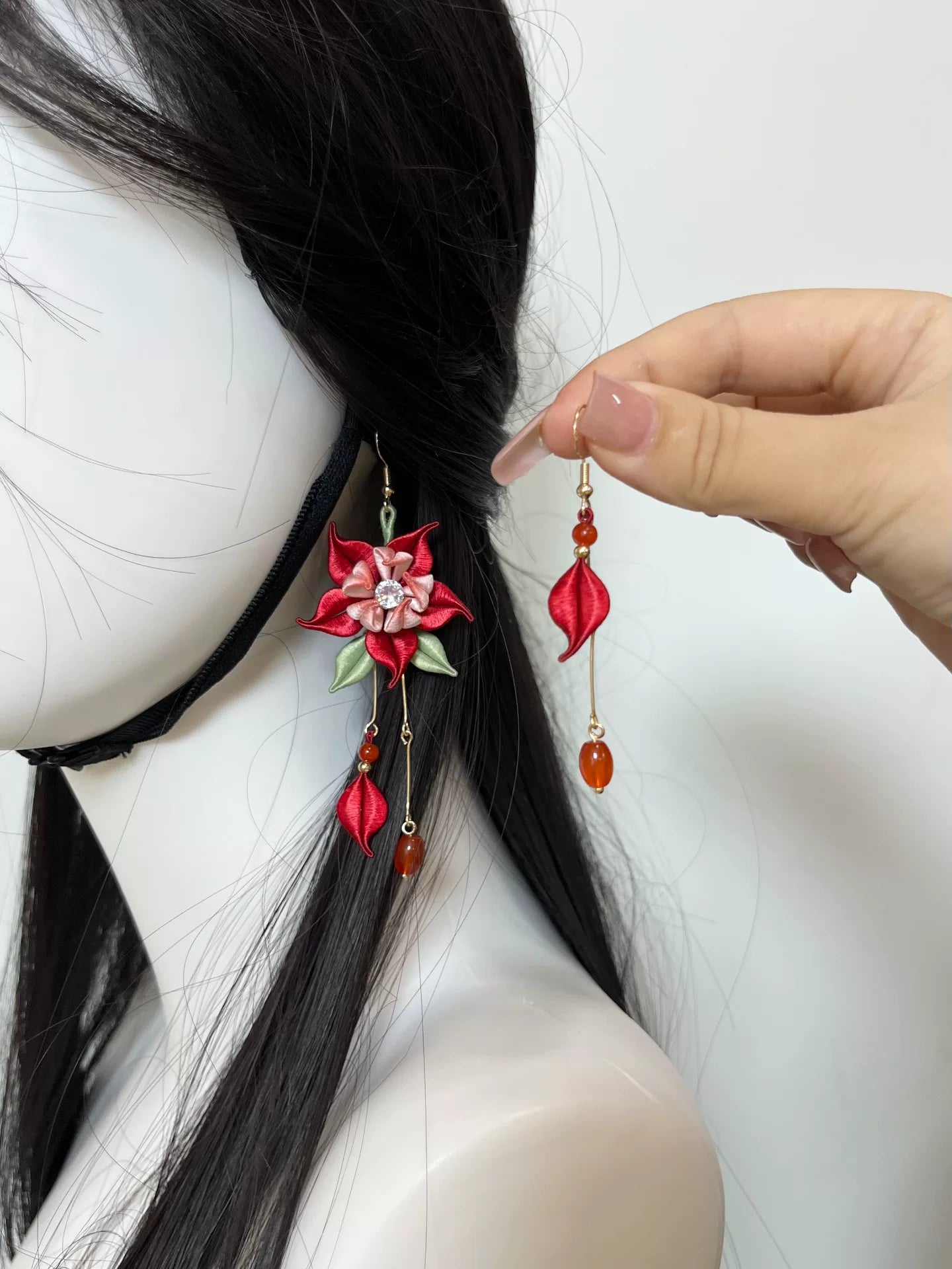 Handmade Chanhua Lu Chen Mandala Flower Earrings on a mannequin