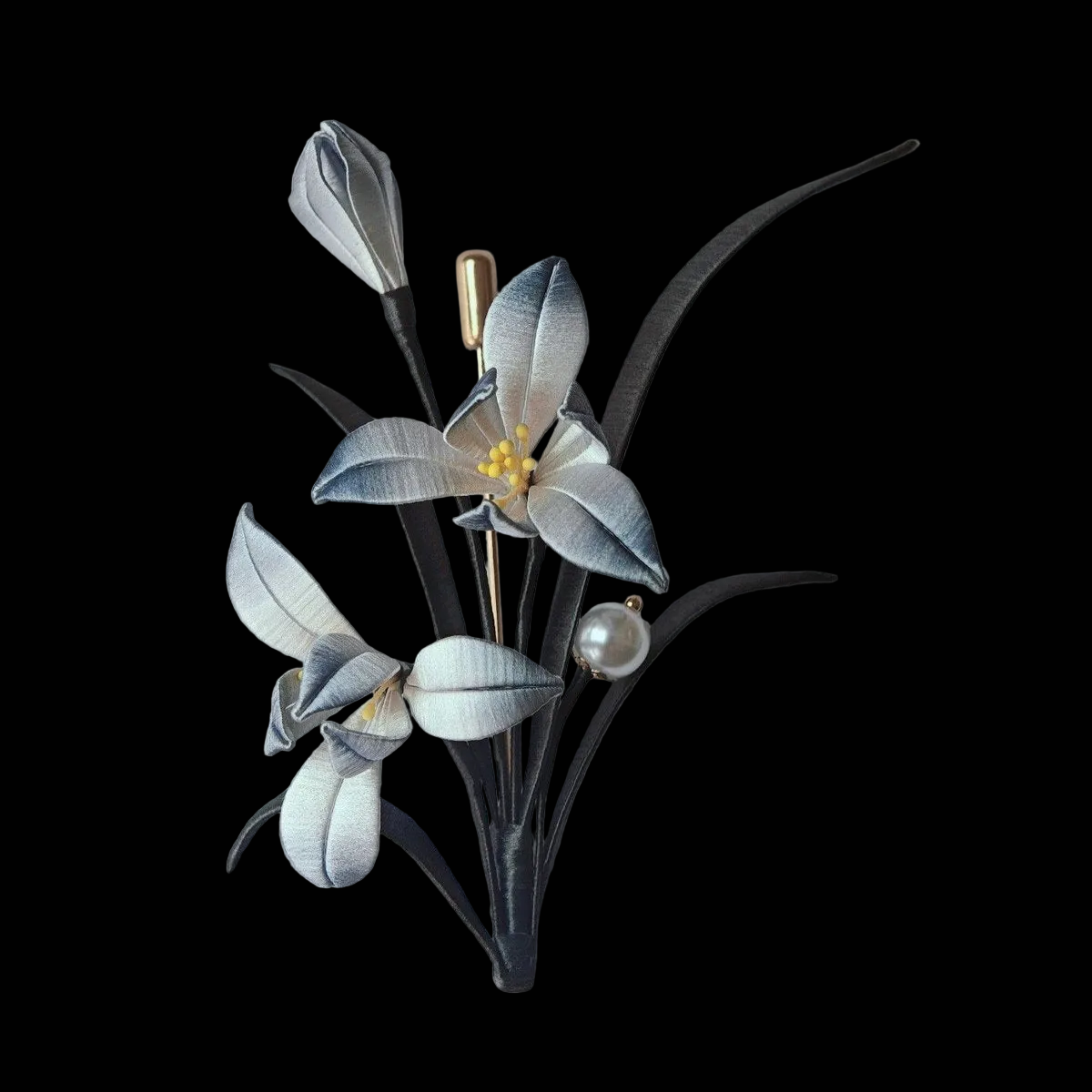 Luxury 3D embroidery floral pin depicting a classical ink-style orchid made with intricate artisanal thread-wrapping.