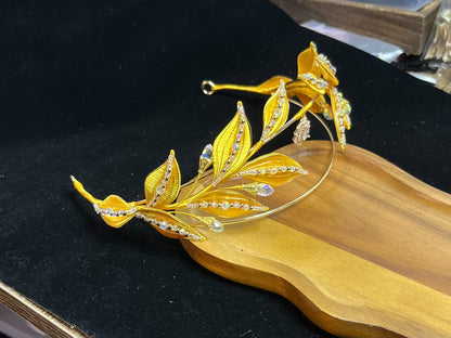 A golden yellow handmade Chanhua laurel crown with crystal embellishments