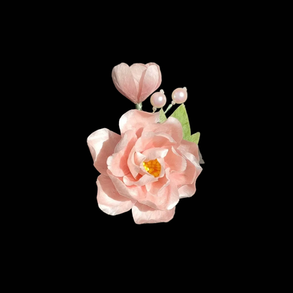 Handcrafted Ronghua Hibiscus brooch featuring soft velvet-textured silk petals in a delicate floral design with pearl accents.