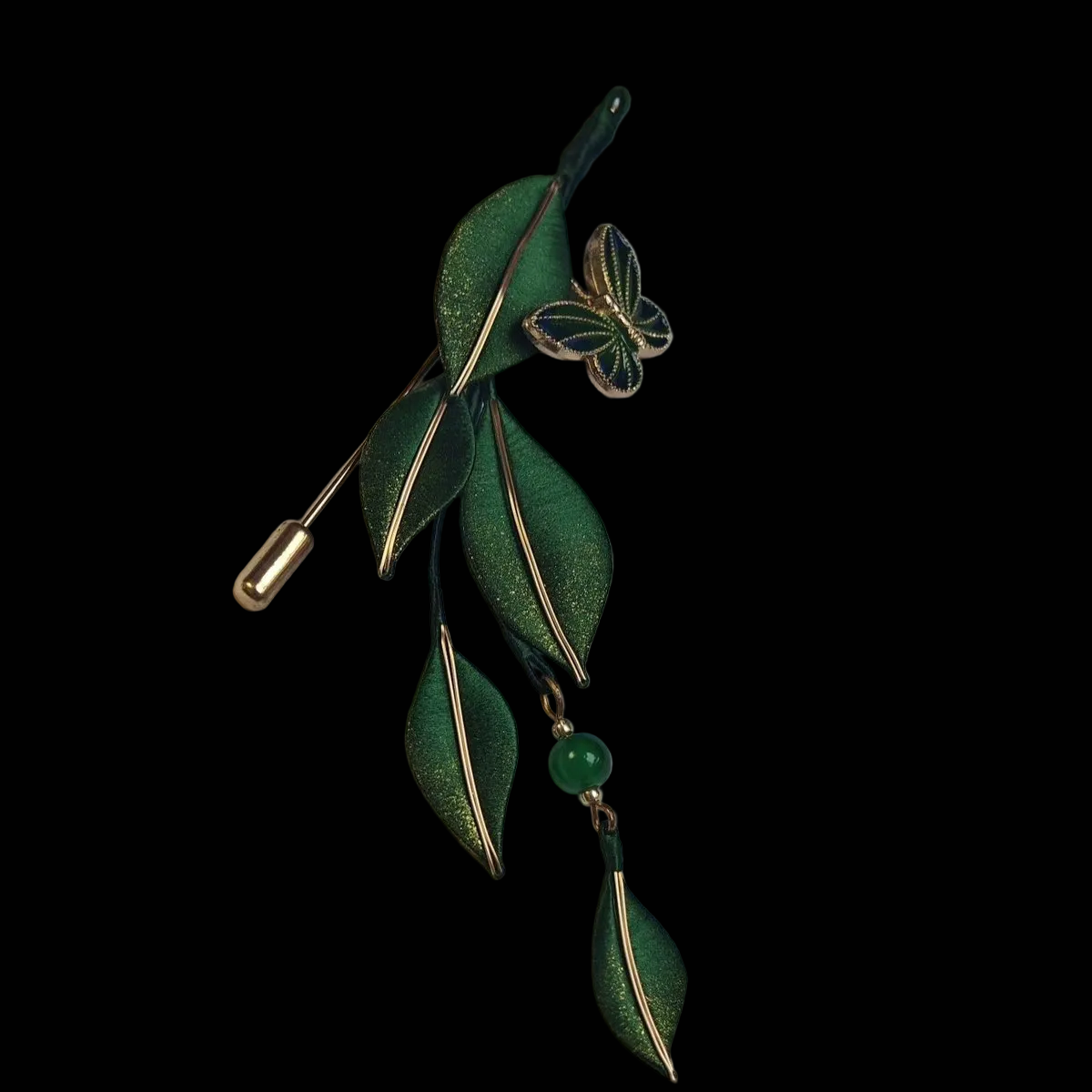 Close-up of a luxury 3D embroidery leaf pin made with intricate thread-wrapping techniques for a shimmering botanical finish.